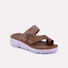 una brown comfy slippers